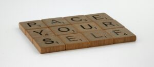 letter tiles that spell "Pace Yourself"