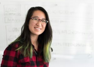 cool teacher in front of whiteboard 