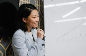 female professional at whiteboard