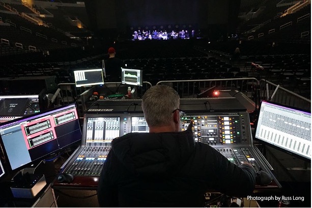 man with an audio mixer