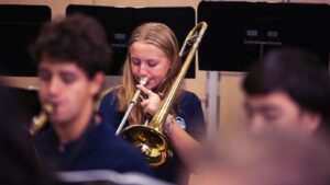 trombone student during rehearsal