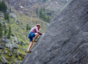 man rock climbing