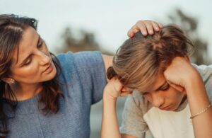 mother consoling her child