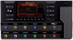 A black guitar effects processor with twelve footswitches, a footpedal and a large touchscreen.