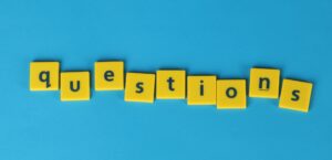 letter tiles spelling out the word "questions"