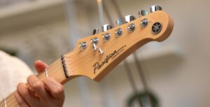 closeup of Yamaha Pacifica guitar headstock 