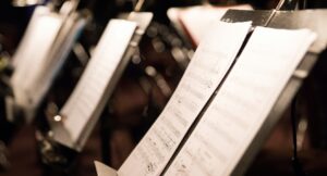 line of music stands with sheet music