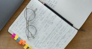 notebook full of notes and tabs