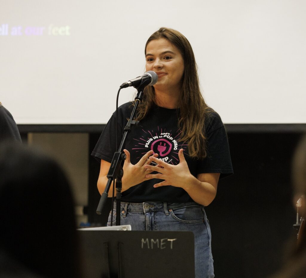 student leader speaking in front of class