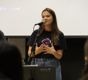 student leader speaking in front of class