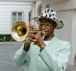 Black man playing trumpet