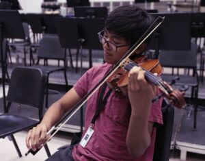 student playing violin