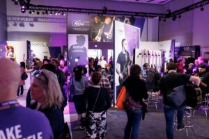 The Yamaha booth at a busy trade show.