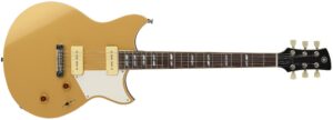 A gold electric guitar.