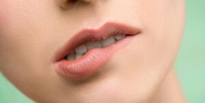 close up someone biting their lip