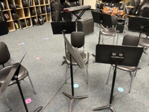 colored dots on floor of rehearsal room