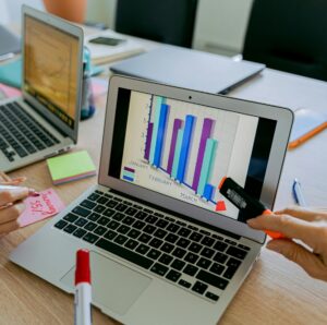 comparison charts on laptop screen