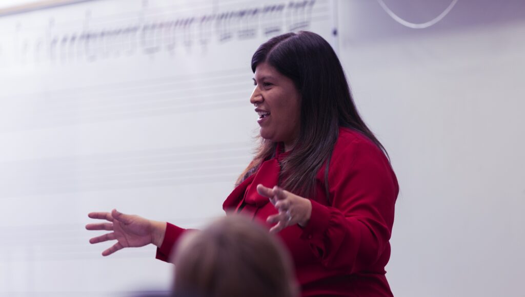 music educator in front of class