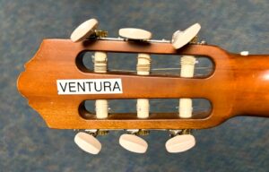student label on guitar headstock