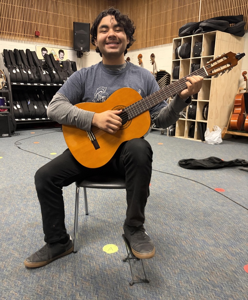 guitar student sitting