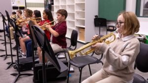 trumpet section during band rehearsal
