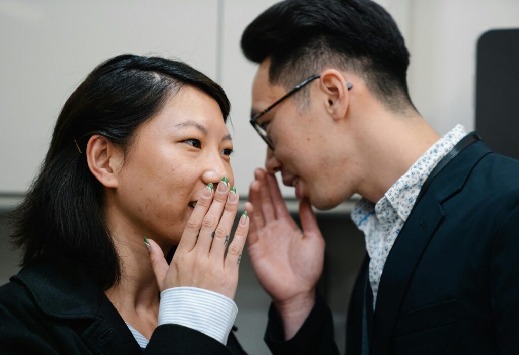 two people gossiping