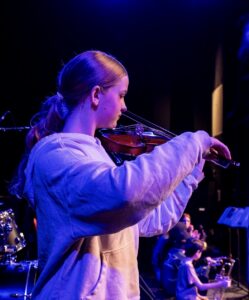 student playing violin
