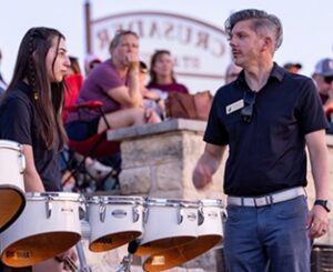 St. Michael's mostly female drumline with music educator Steve Moreland 