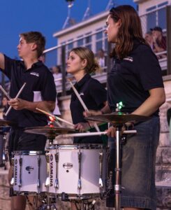 St. Michael's mostly female drumline in the bleachers