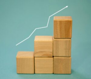 blocks with growth arrow above them