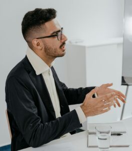 man talking and explaining