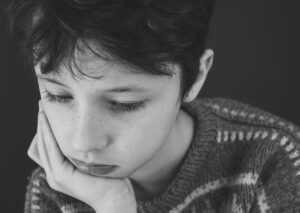 young student looking sad