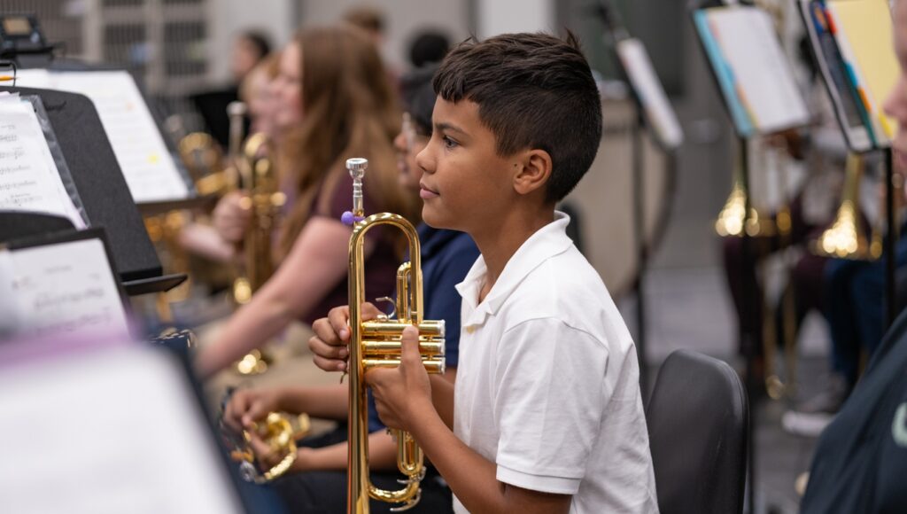 trumpet section during rehearsal