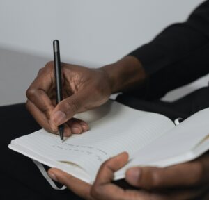 writing in notebook