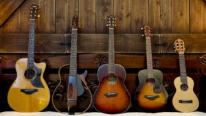 Five acoustic guitars: the Yamaha AC5R, SLG220N, CSF3M, JR2S and GL1.