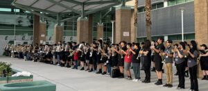 line of middle school band students preparing for performance