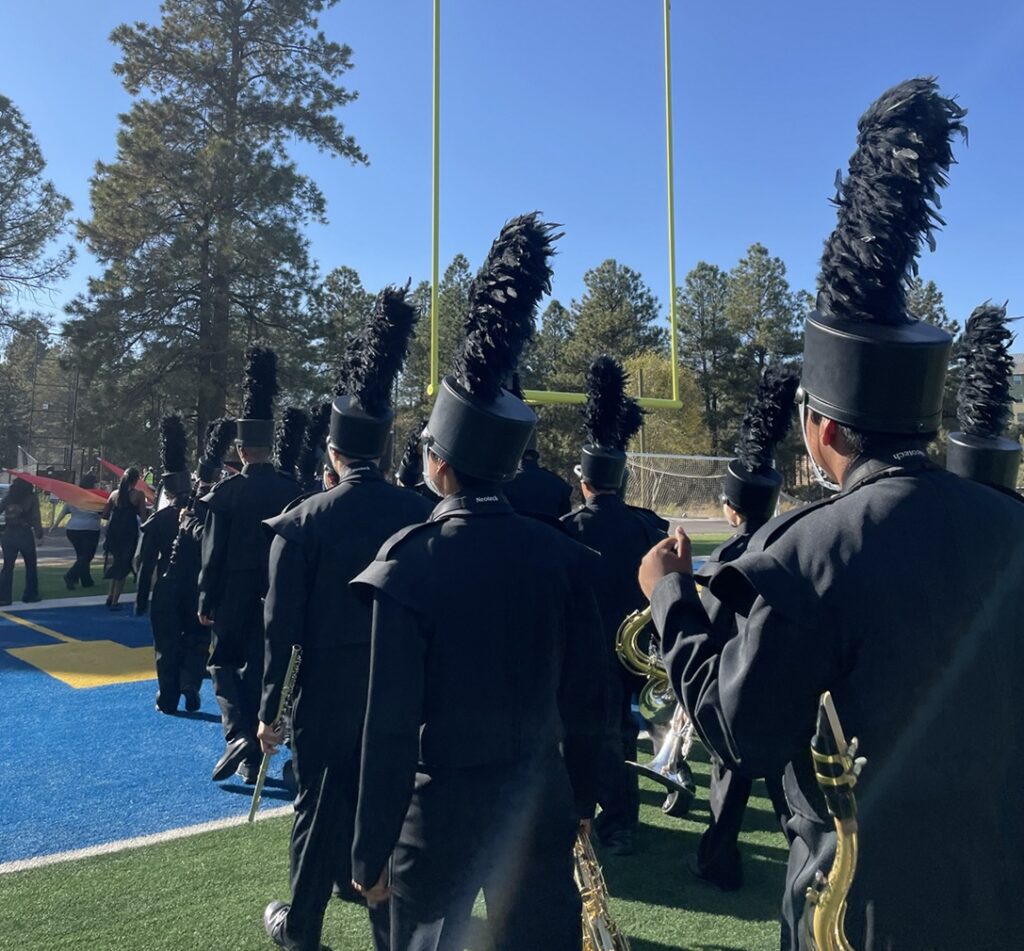 marching band ready to enter field