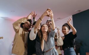 small group celebrating and taking a selfie