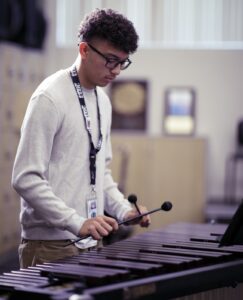 percussion student playing keyboard instrument
