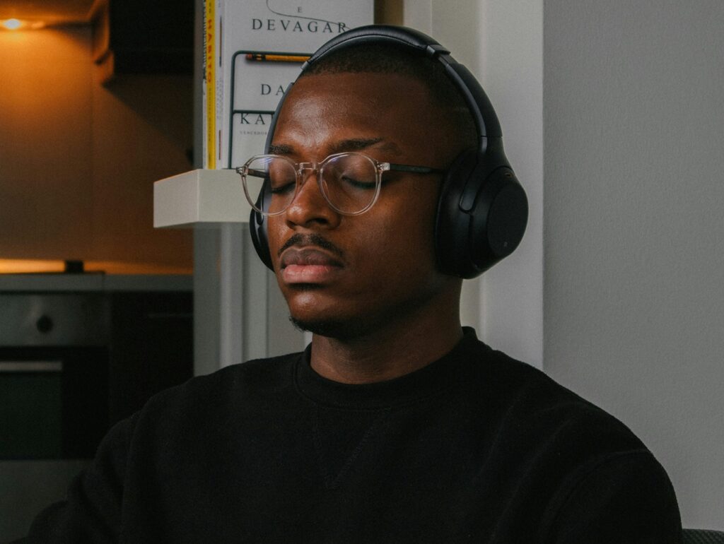 someone relaxing with headphones on