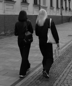 two women walking together